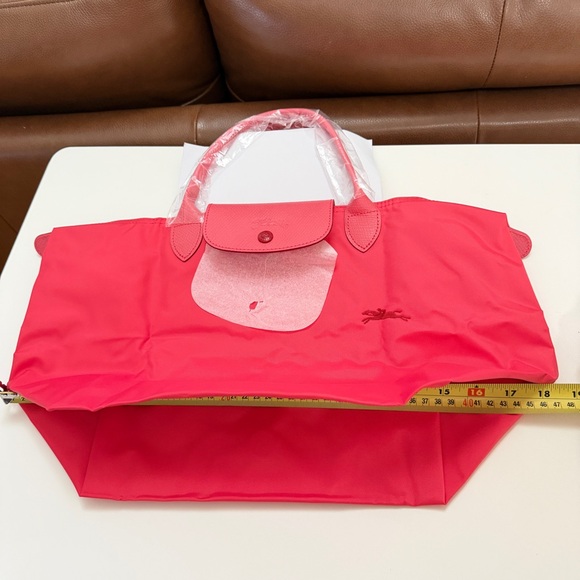 Longchamp top handle short handle tote
Grenade
L1623619P35 - Picture 9 of 12